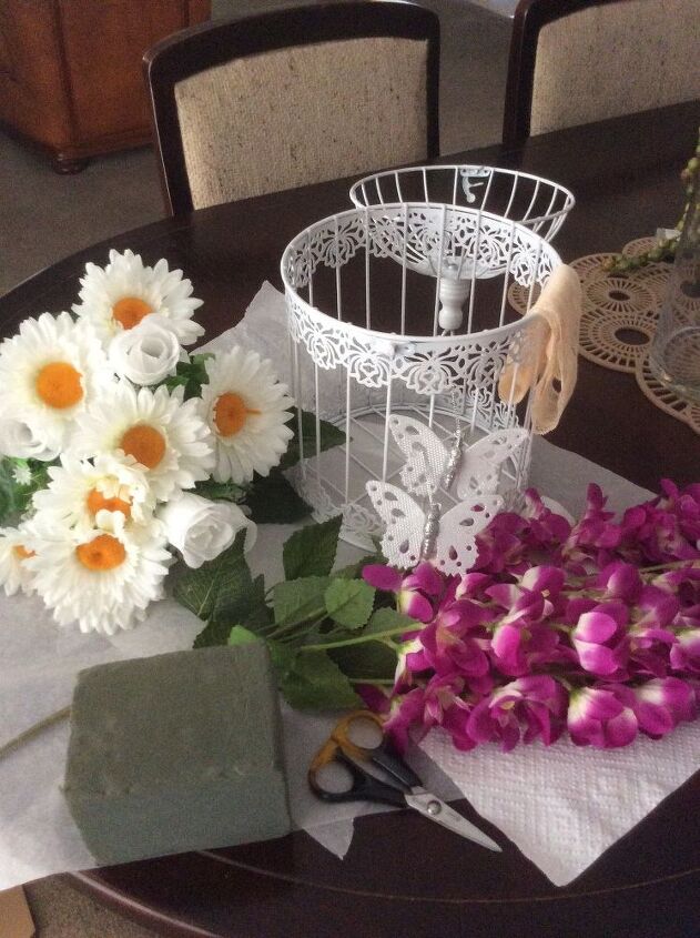 como decorar una jaula de pajaros con flores artificiales